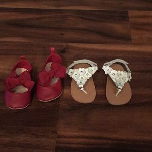 Red baby Gap shoes and white teeny toes Sandler’s